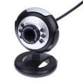 USB webcam with six white LED lights around the lens for video calls.