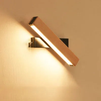 Wooden adjustable LED wall lamp in modern design with black or white finish options