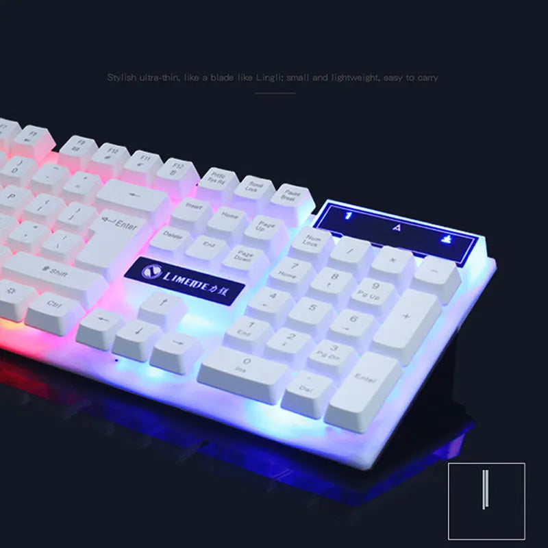 GTX300 black and white wired gaming keyboard and mouse set with backlit keys on desk.