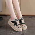 Women's black mesh half slippers with round toe and rubber sole, shown from the side.
