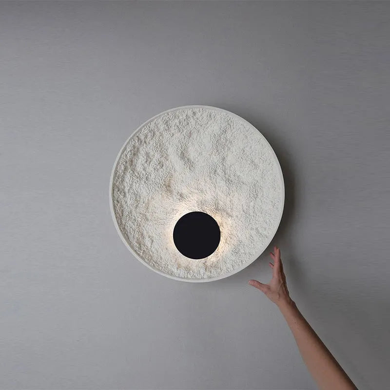 White iron wall lamp with modern digital shape in two size options for bedside lighting