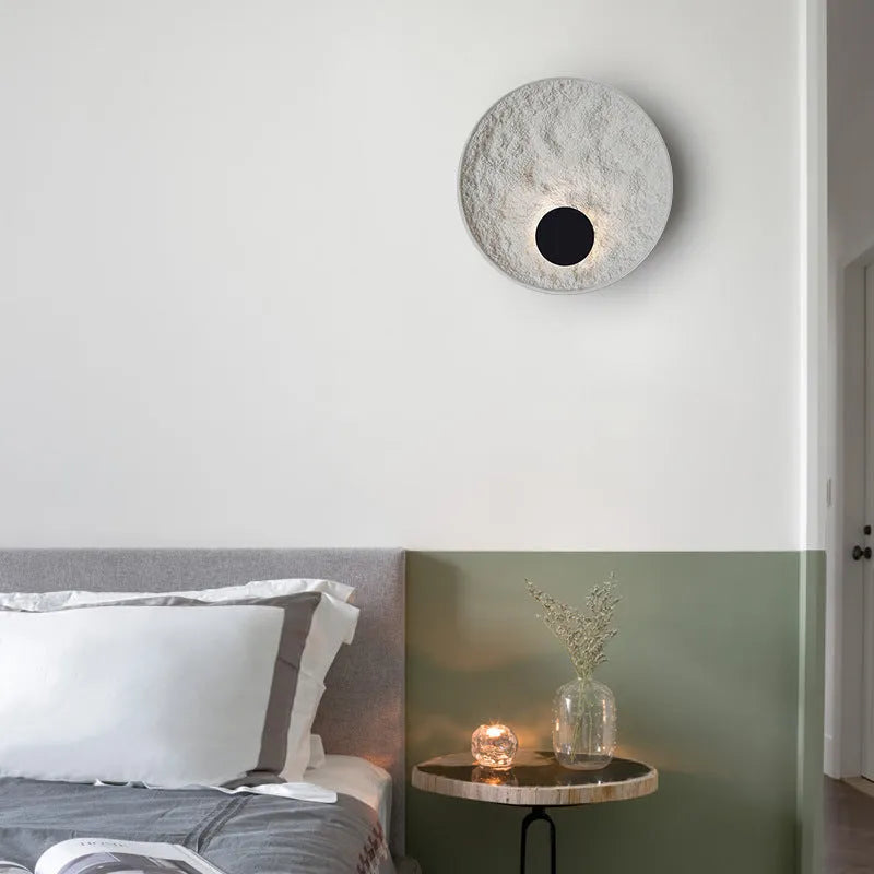 White iron wall lamp with modern digital shape in two size options for bedside lighting