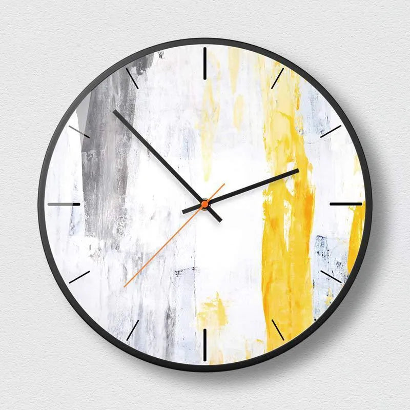 Round abstract art wall clock with metal frame in mysterious black, shown in 12 inch and 14 inch sizes.
