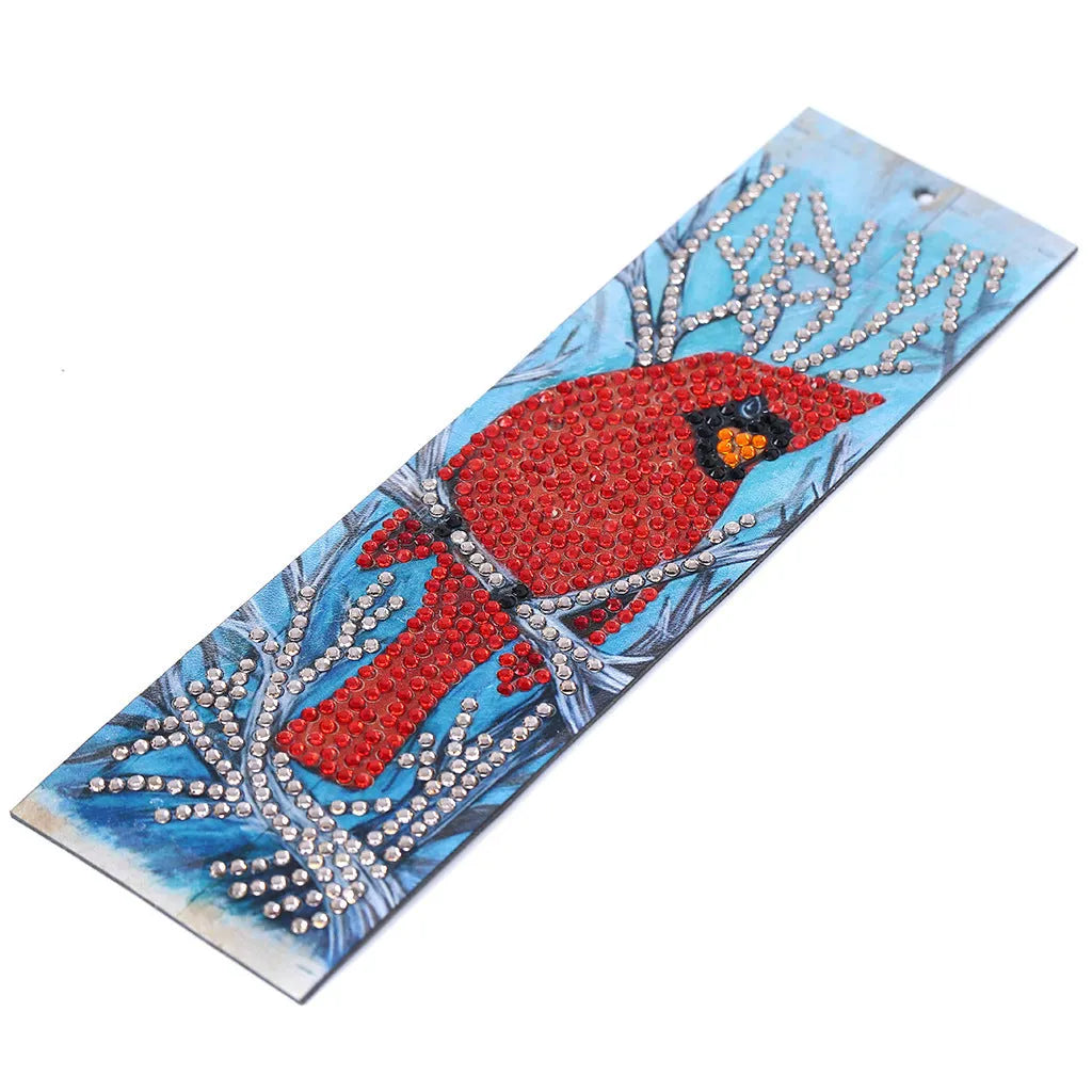 Leather diamond painting bookmark with red bird design, special-shaped diamonds, and attached pendant on a clean background
