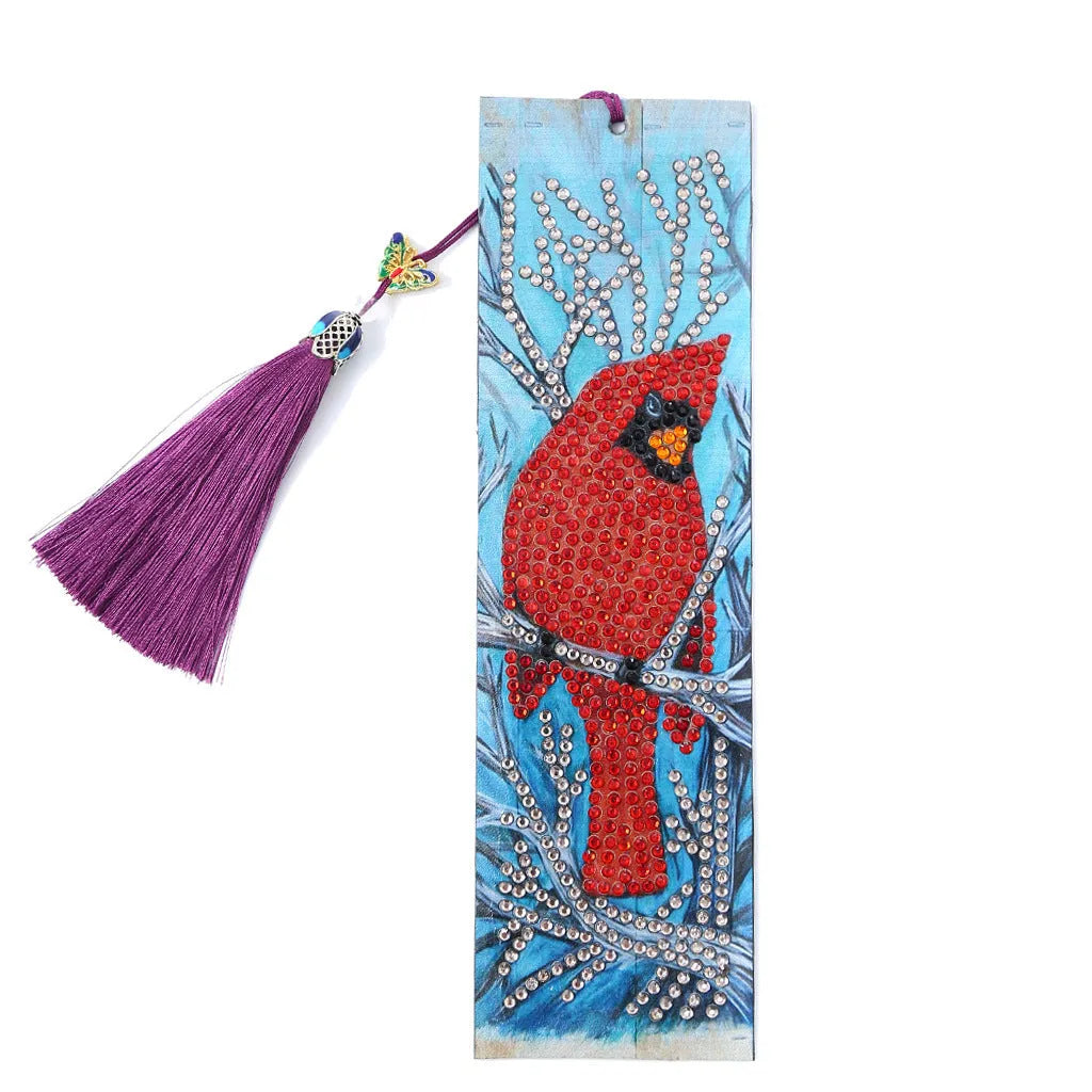 Leather diamond painting bookmark with red bird design, special-shaped diamonds, and attached pendant on a clean background