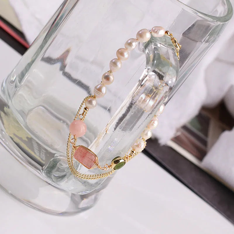 Women's pink freshwater pearl bracelet with geometric strawberry crystal design elements