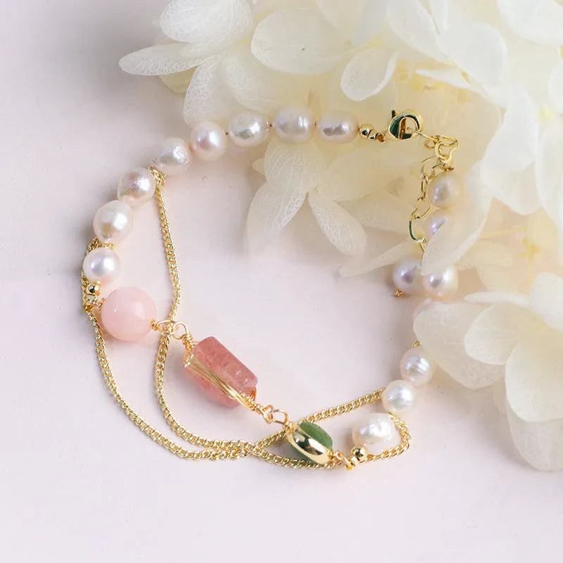 Women's pink freshwater pearl bracelet with geometric strawberry crystal design elements