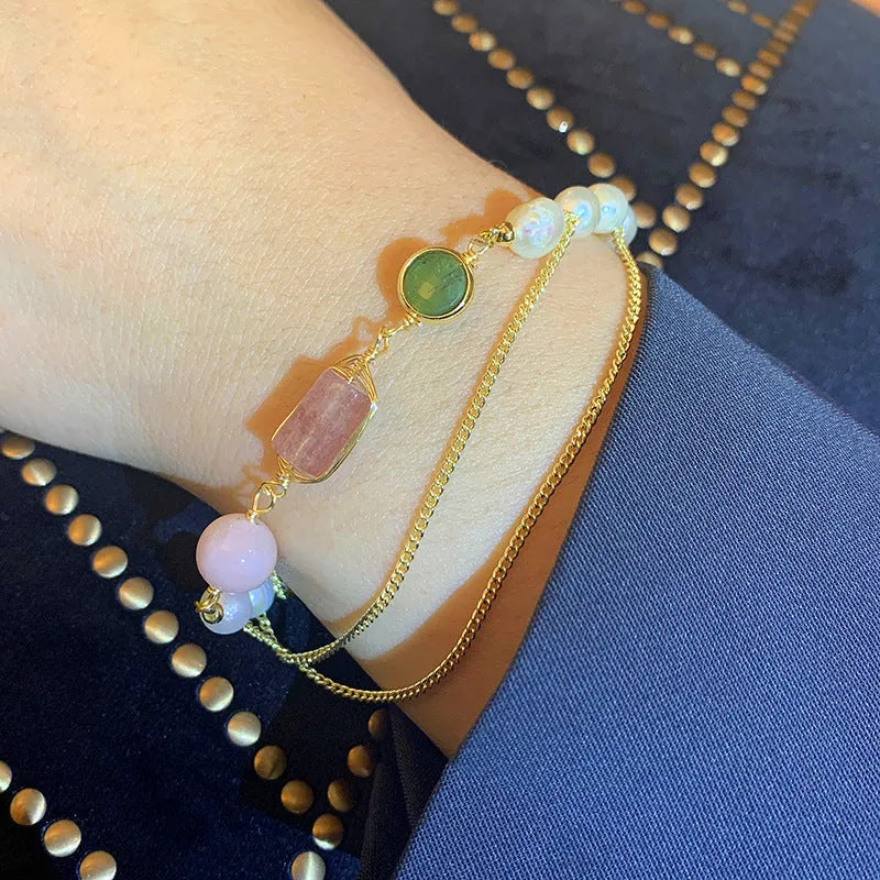 Women's pink freshwater pearl bracelet with geometric strawberry crystal design elements