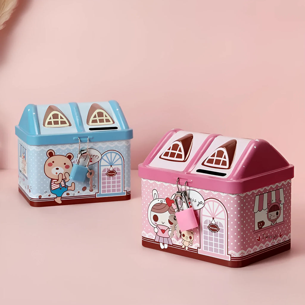 Blue house-shaped tinplate piggy bank on desktop with coin slot visible