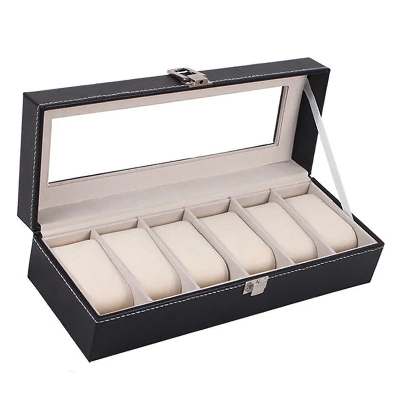 Black wooden watch display box with clear lid showing six individual watch compartments inside.