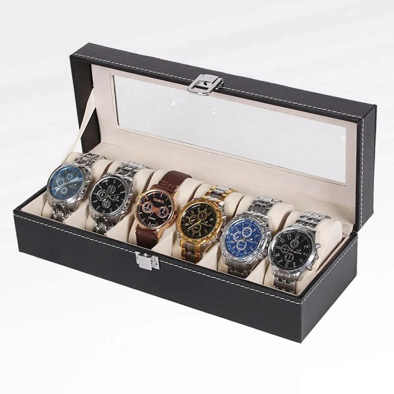 Black wooden watch display box with clear lid showing six individual watch compartments inside.