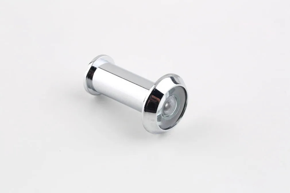 LCD wireless door peephole monitor kit with indoor screen, outdoor camera, and DIY installation tool.