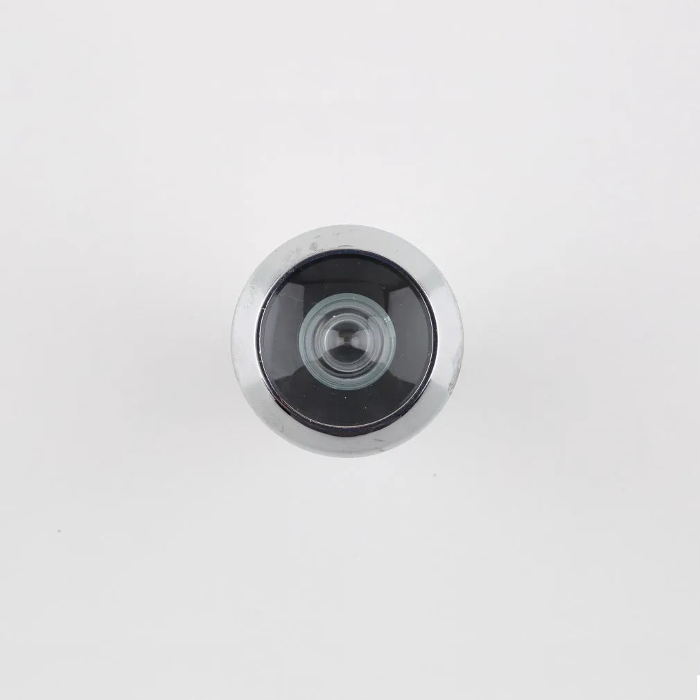 LCD wireless door peephole monitor kit with indoor screen, outdoor camera, and DIY installation tool.