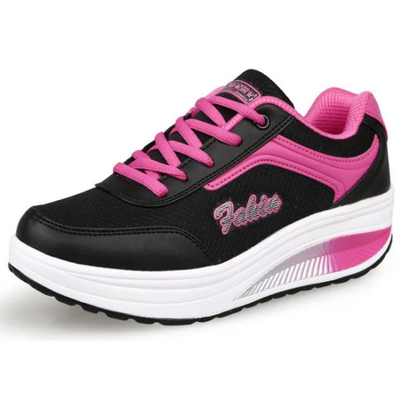 Women's slip-on casual shoe in a mid-heel style, shown in one of the available colours.