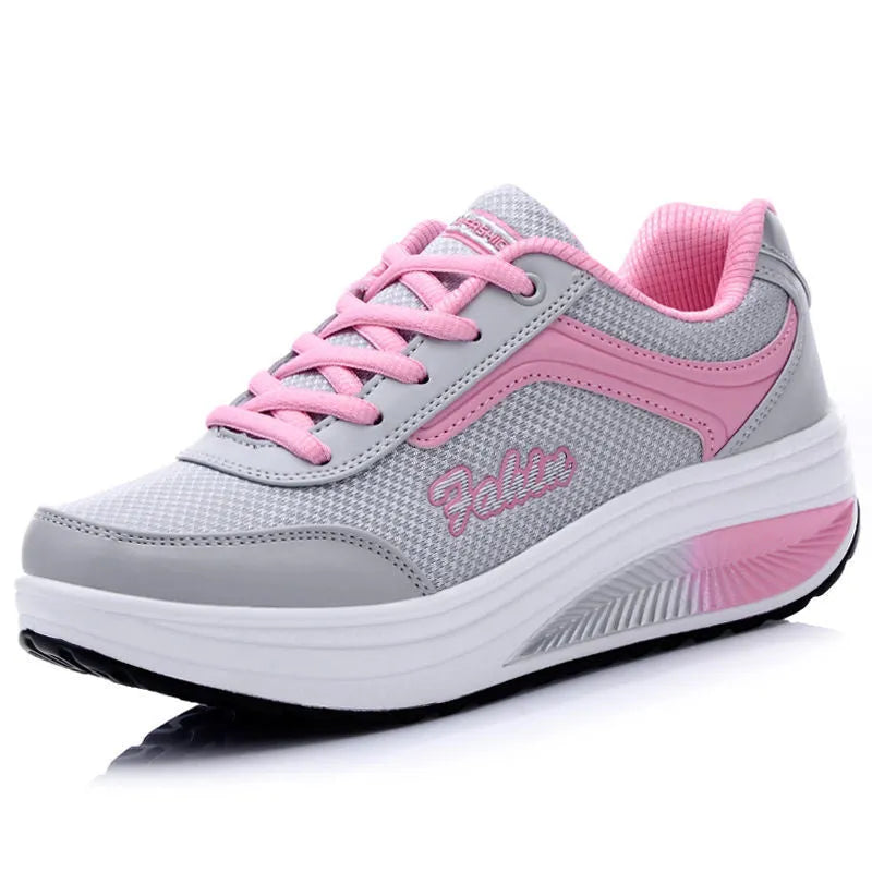 Women's slip-on casual shoe in a mid-heel style, shown in one of the available colours.