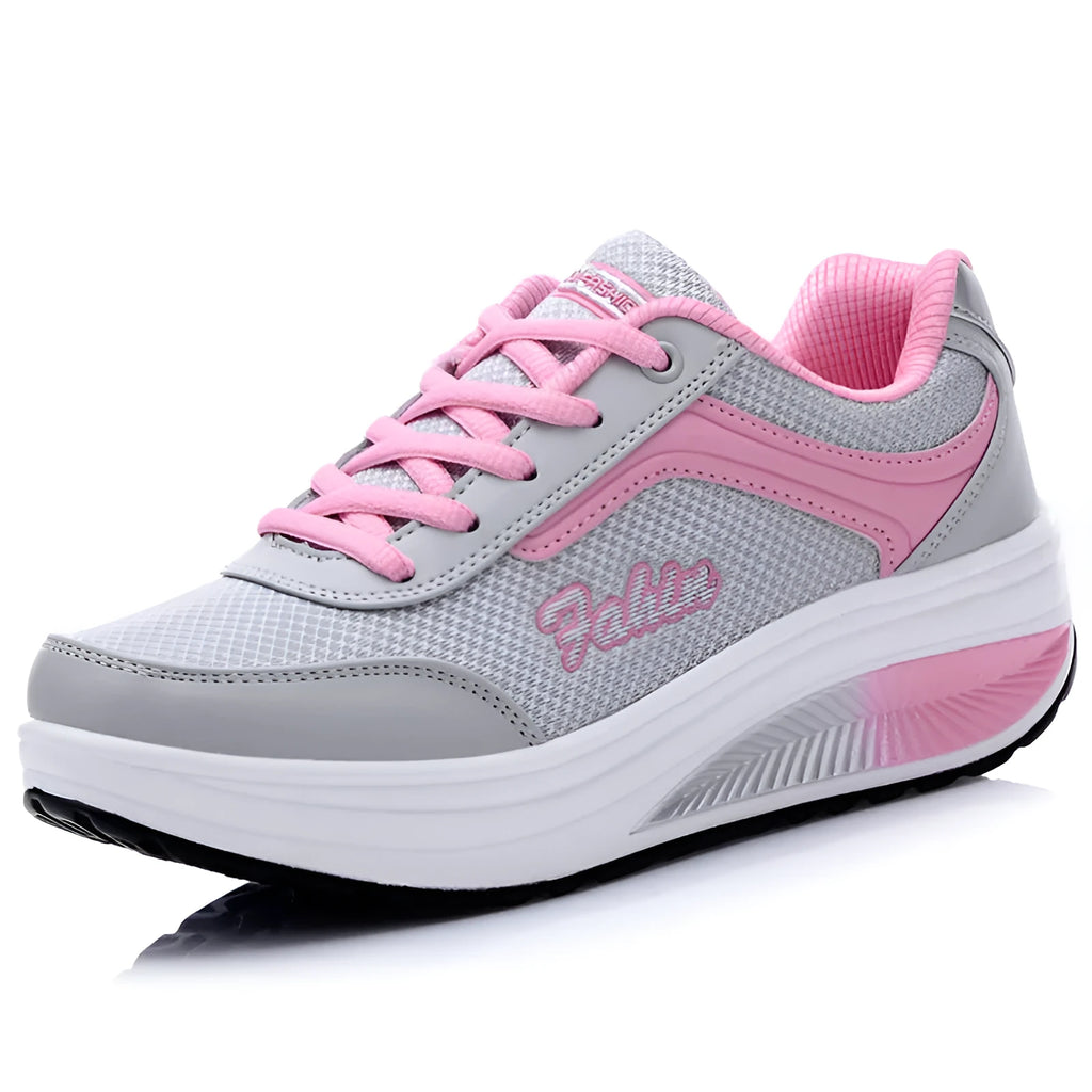 Women's slip-on casual shoe in a mid-heel style, shown in one of the available colours.
