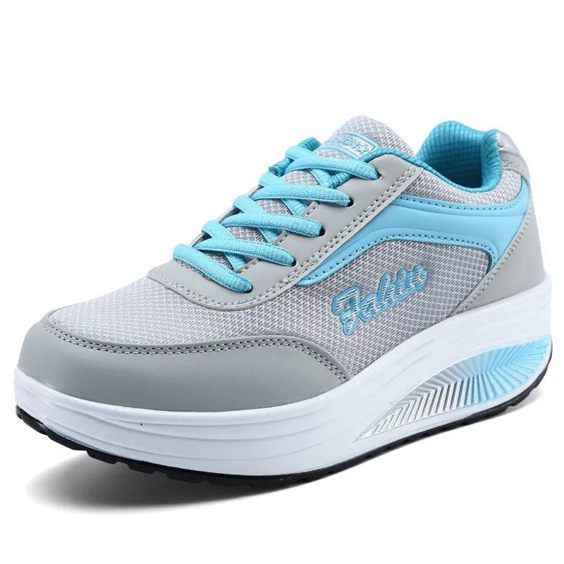 Women's slip-on casual shoe in a mid-heel style, shown in one of the available colours.
