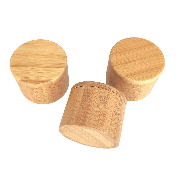 Bamboo seasoning box with a bamboo spoon in single compartment, double round, and pear-shaped designs.