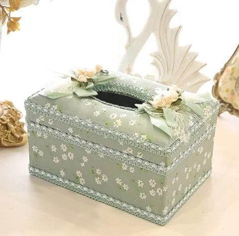 Ceramic jewellery and tissue box in bright colour with separate compartments for jewellery storage and tissue dispensing
