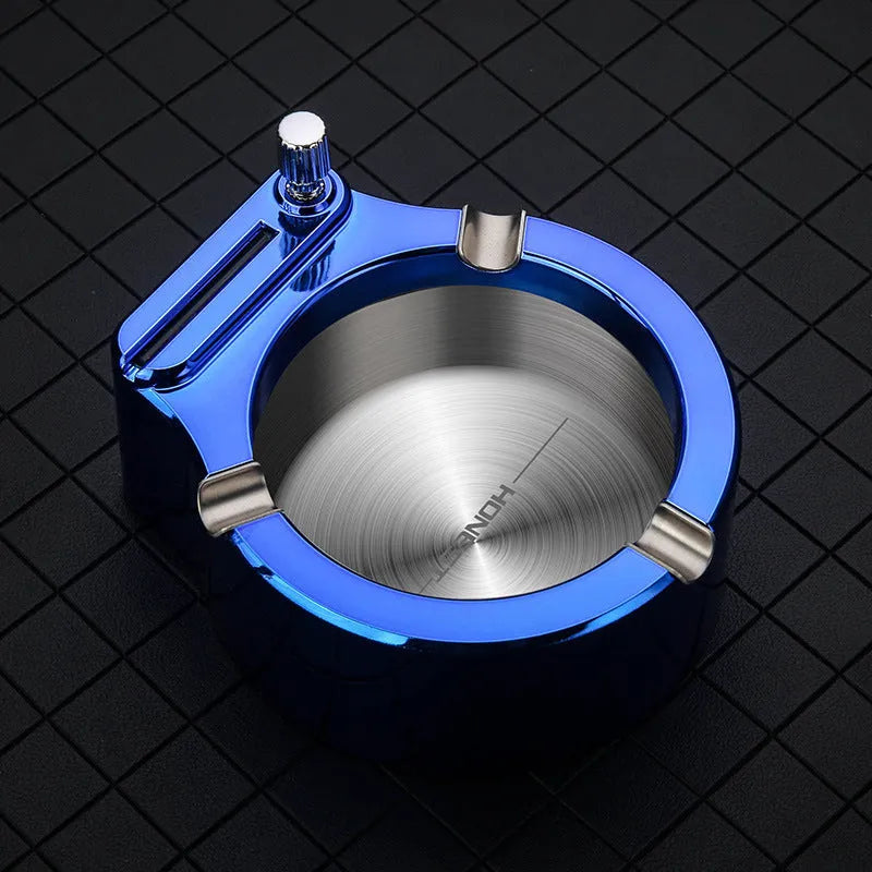 Large stainless steel ashtray with permanent match lighter in blue colour showing cigarette slots