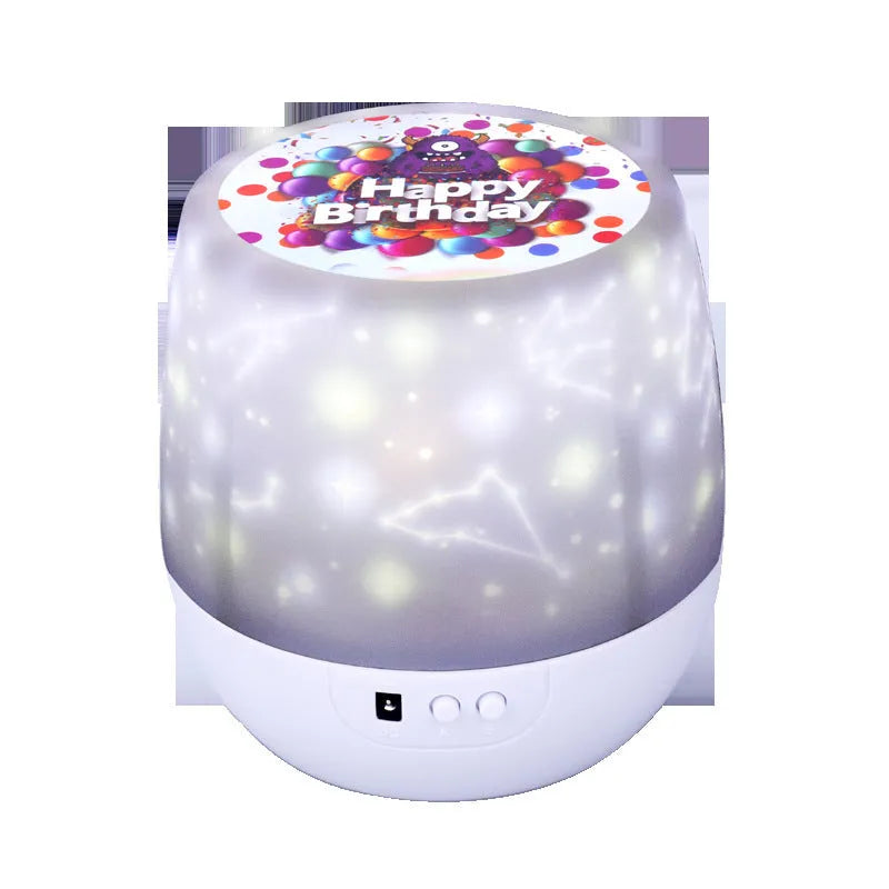 Starry sky projection lamp showing cosmic film image with plastic housing and push button.