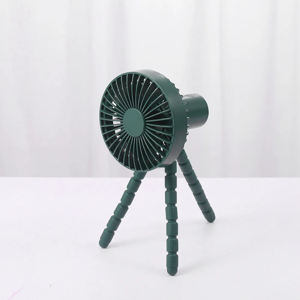 Small adjustable tripod desk fan with a bending head, shown in black, green, pink, or white.