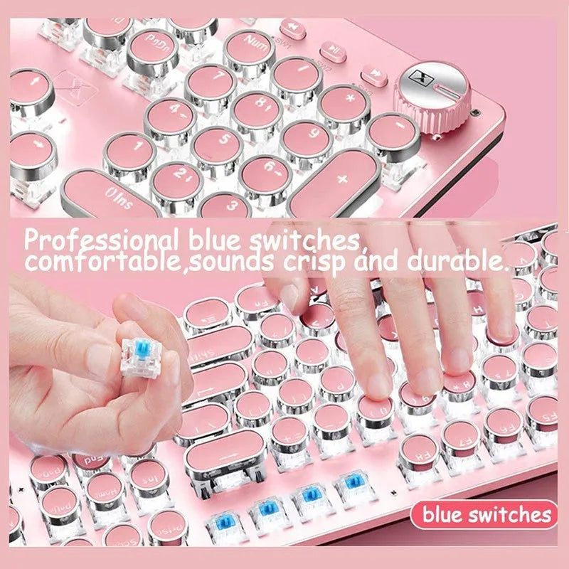 Green axis mechanical keyboard with silver bottom and pink accents, multimedia keys, USB wired connection
