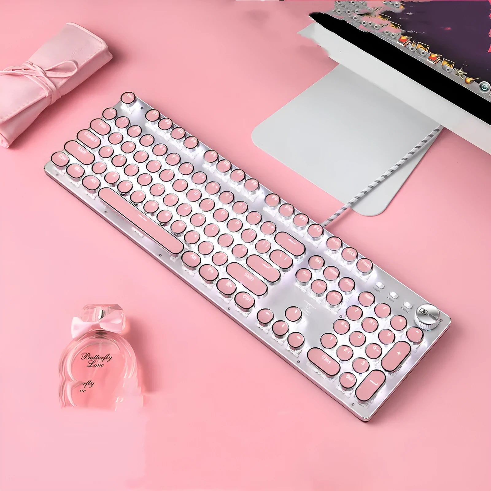 Green axis mechanical keyboard with silver bottom and pink accents, multimedia keys, USB wired connection