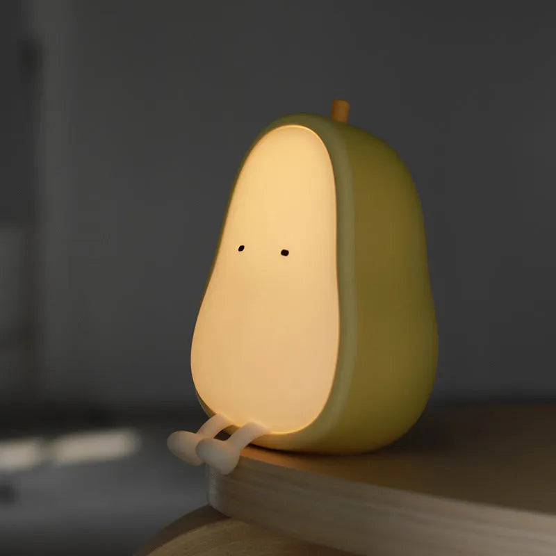PEAR NIGHT LAMP warm yellow silicone rechargeable LED night light on bedside table, 122mm height