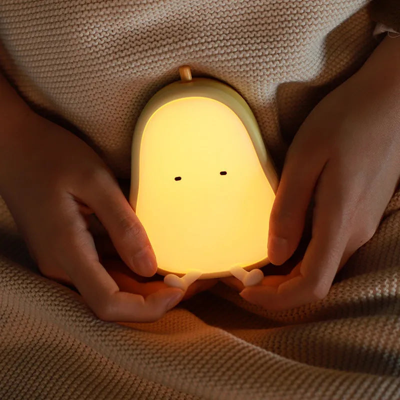 PEAR NIGHT LAMP warm yellow silicone rechargeable LED night light on bedside table, 122mm height