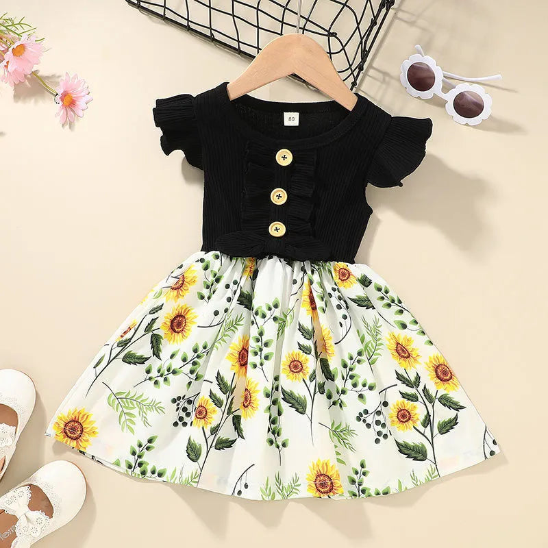 Toddler girl wearing sleeveless summer dress in one of six colour options