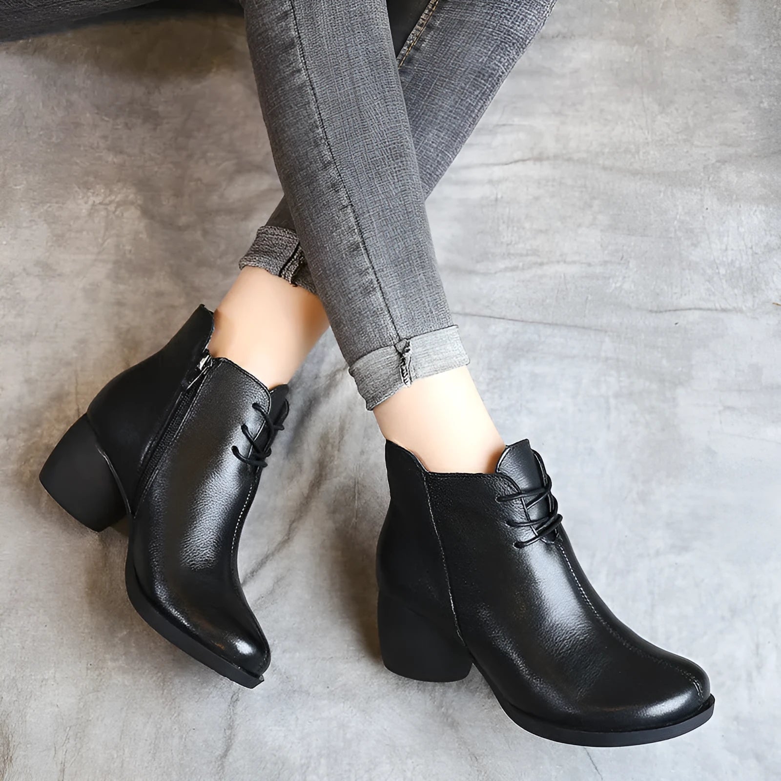 Women's black leather Martin boots with thick mid-heel and round toe design
