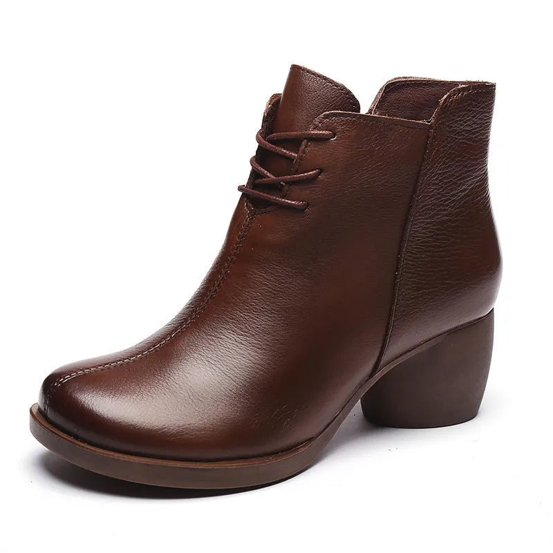 Women's black leather Martin boots with thick mid-heel and round toe design