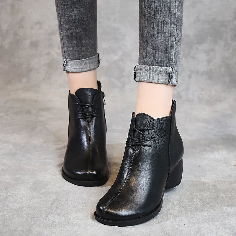 Women's black leather Martin boots with thick mid-heel and round toe design