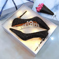 Women's silver PU leather bridal shoes with crystal detail on a stiletto heel.