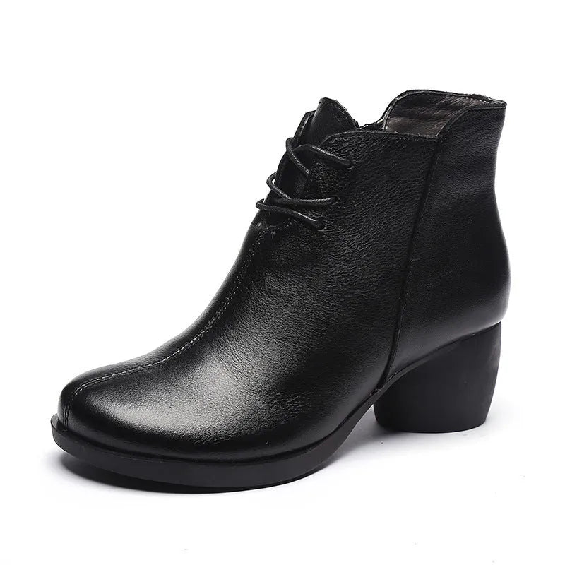 Women's black leather Martin boots with thick mid-heel and round toe design