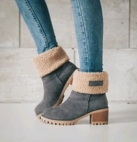 Women's mid-calf suede snow boots with a thick low heel and round toe in grey.