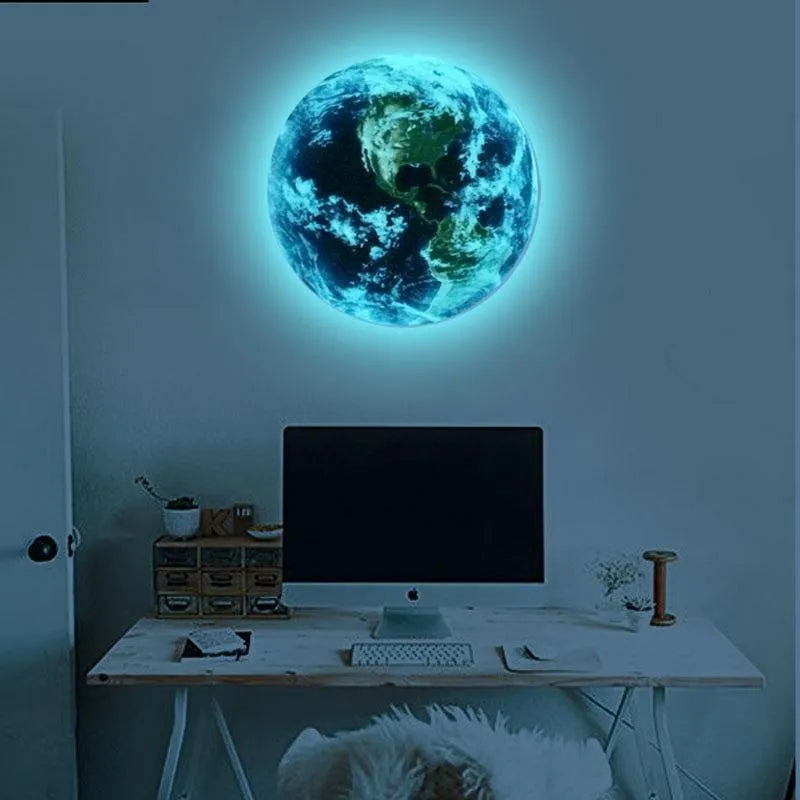 Glow in the dark 3D Earth planet wall sticker in three size options on a dark background