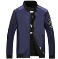 Men's reversible flight jacket showing stripe pattern on both sides, zipper closure, and no-collar design