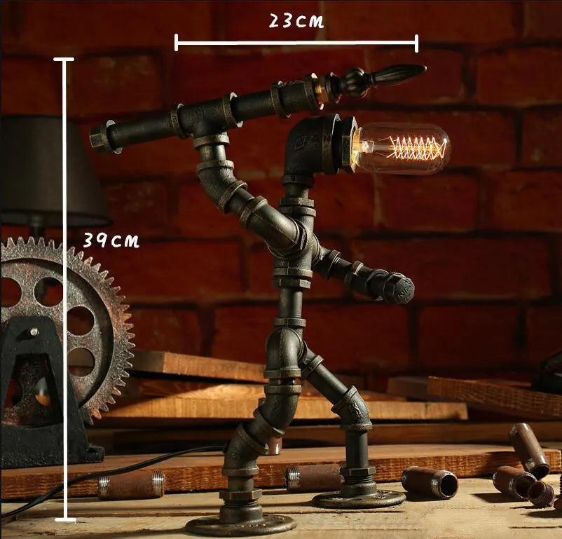 Robot vintage industrial table lamp with iron pipe construction in green bronze finish
