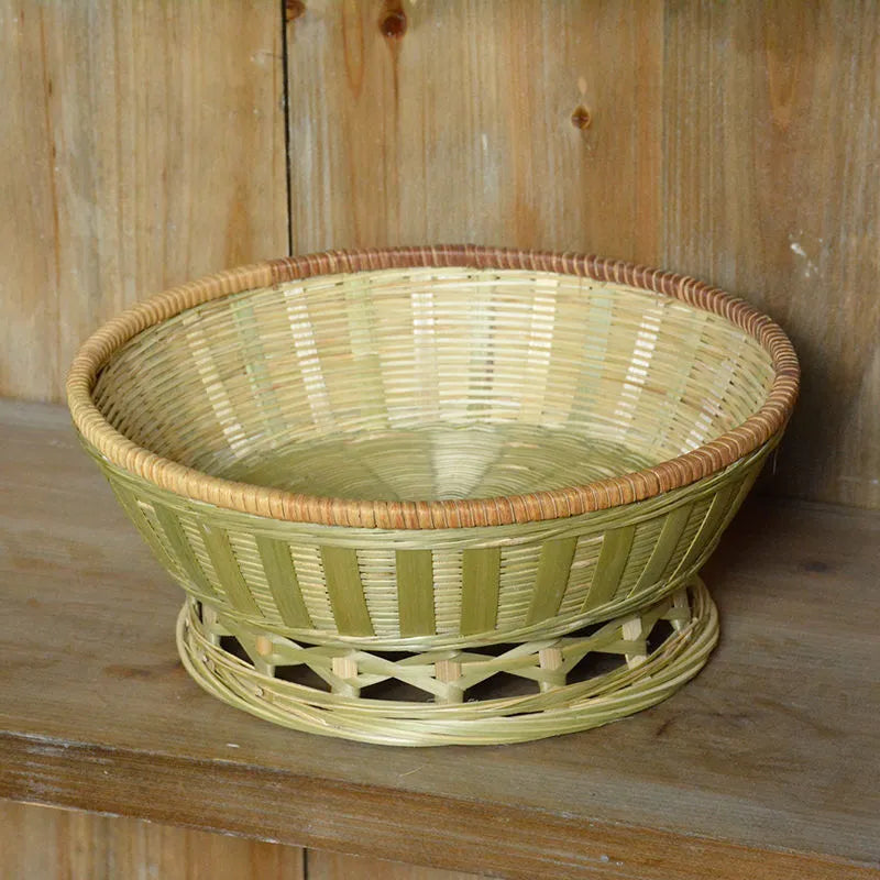 Handmade natural bamboo storage basket in a rectangular woven shape.