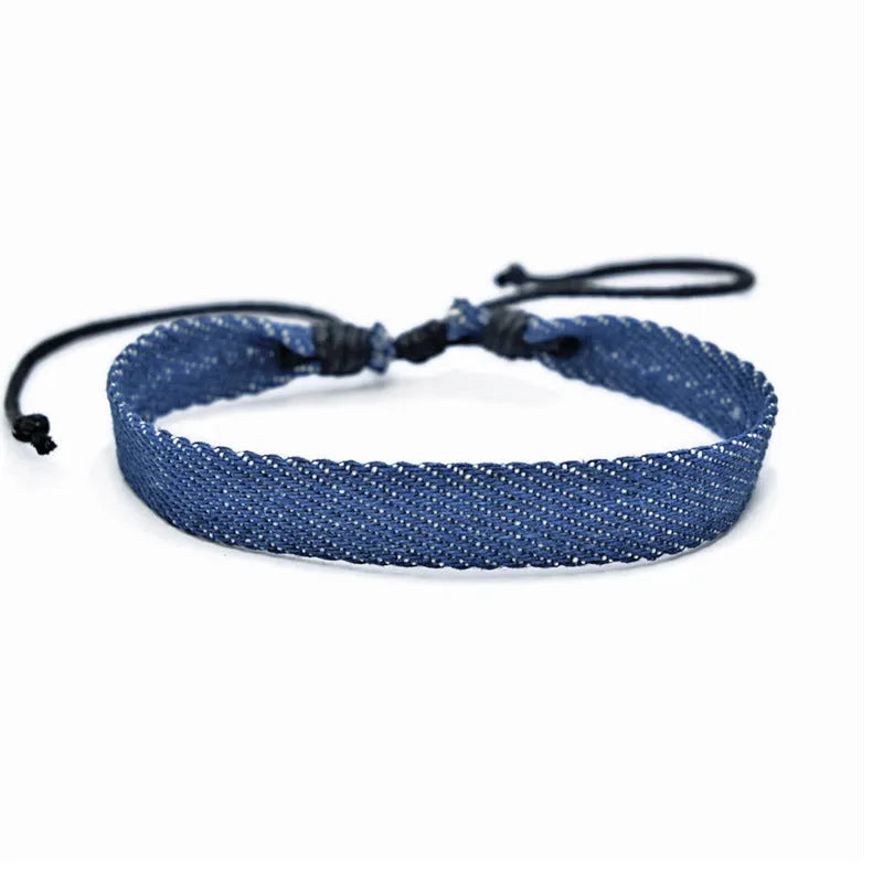 National style denim fabric unisex bracelet carrying strap in a selected colour.