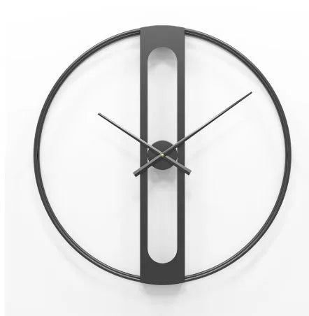 Round metal wall clock with 50cm diameter in black or gold colour on a wall.
