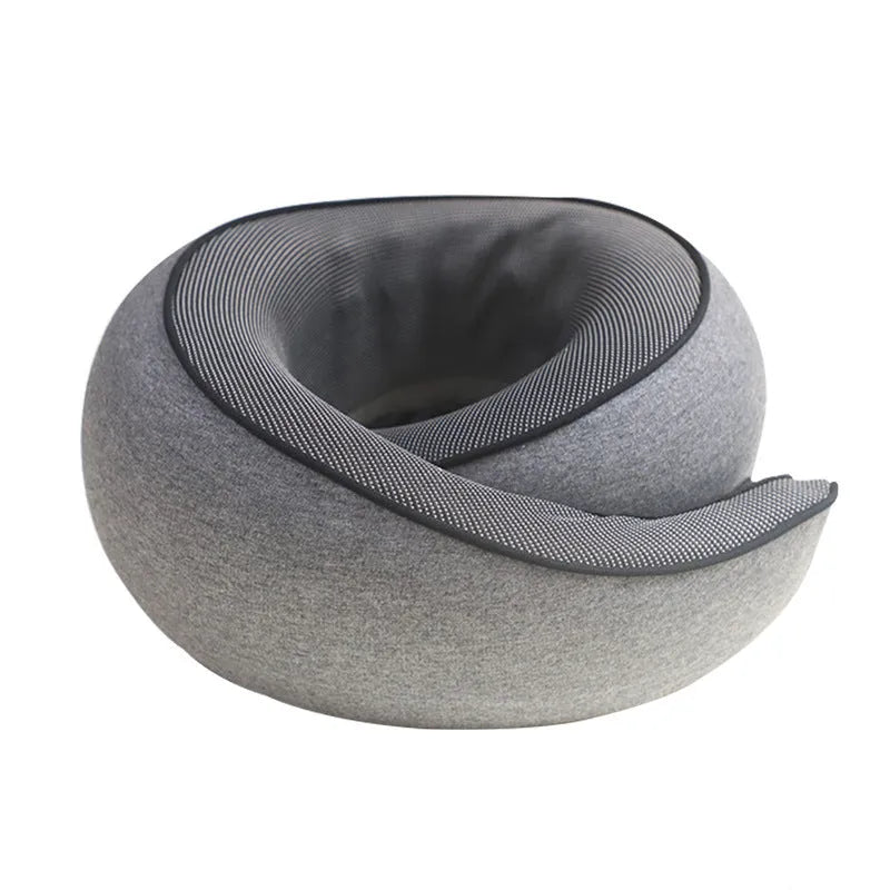 Grey U-shaped memory foam travel neck pillow with a storage bag.