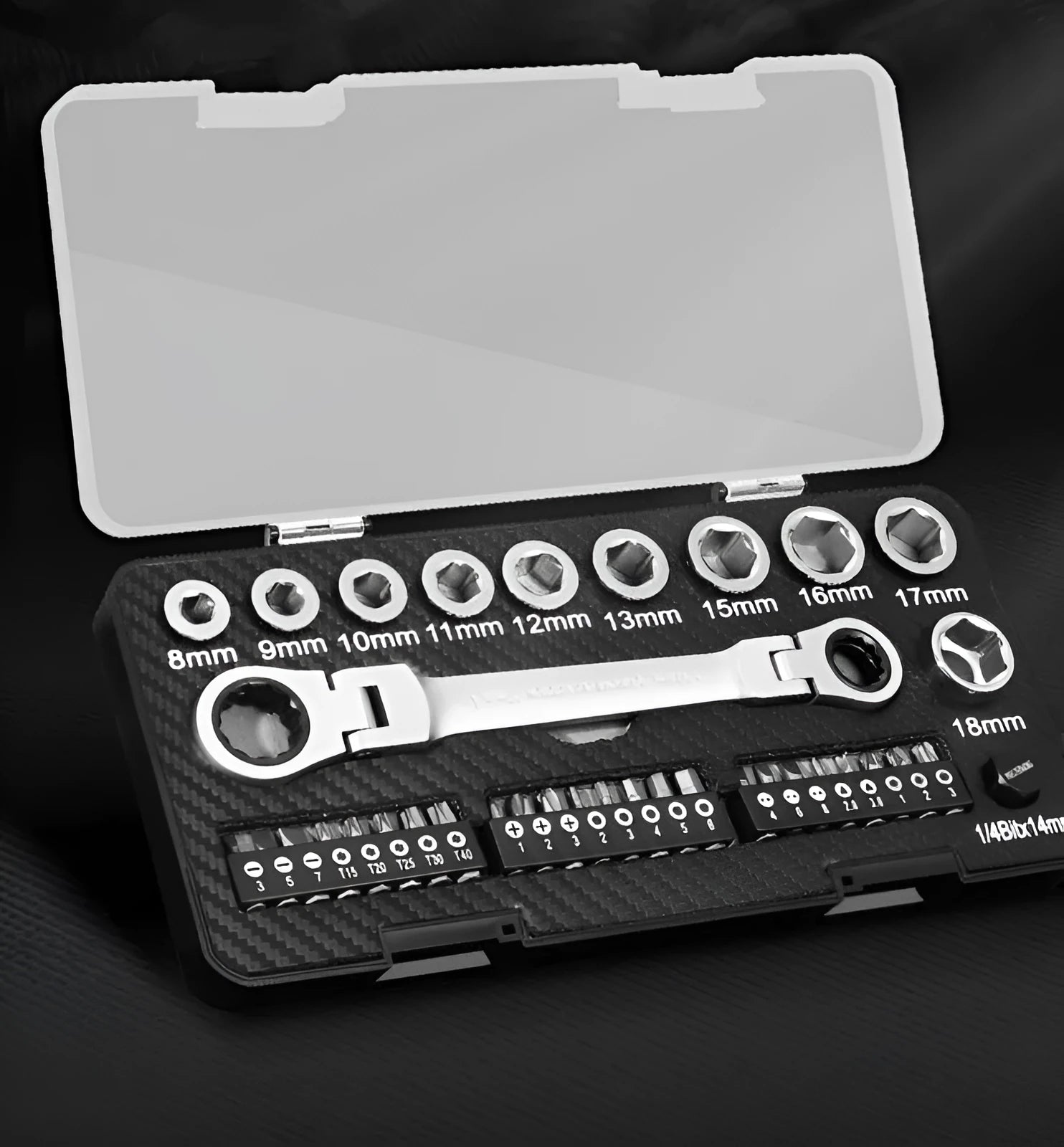 Two-way ratchet wrench set with dual-purpose handle, 10 sockets, and 3 bit heads laid out on a surface.