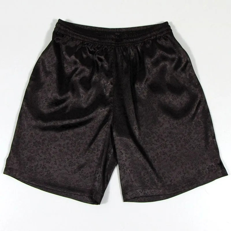 Men's traditional black Tang suit shorts with elasticated drawstring waistband laid flat