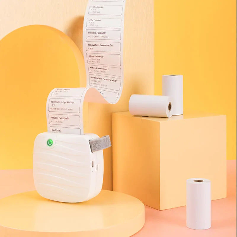 Box containing three rolls of white 57mm wide thermal paper for small printers.