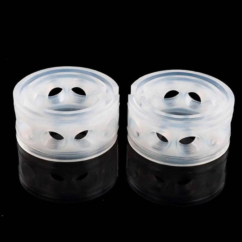 Two transparent rubber shock absorber buffers for car suspension springs, shown with size measurement diagram.