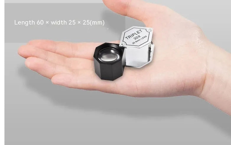 Handheld metal magnifying glass with optical glass for jewellery and coin identification at 10x to 30x magnification