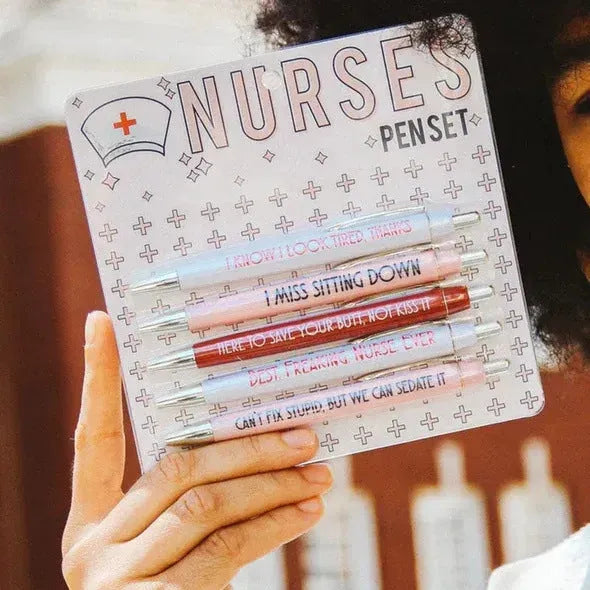 Set of five nurse-themed ballpoint pens with humorous nursing copywriting printed on plastic barrels